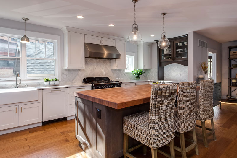 This small kitchen features White Cabinet Mid Century Modern Denver Kitchen Remodel