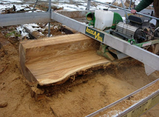 Milling urban wood to be used it beautiful custom kitchen cabinets by Homestead.