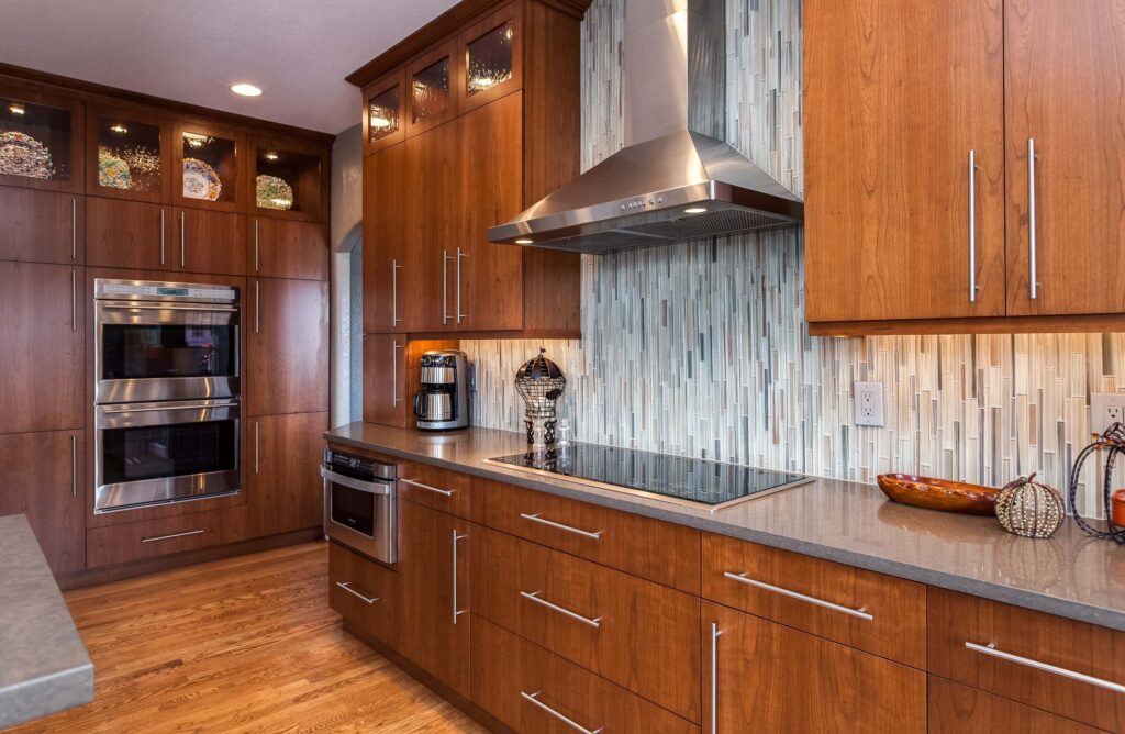 long nickel hardware on cabinets is modern feature of kitchen remodel JM Kitchen & Bath Design