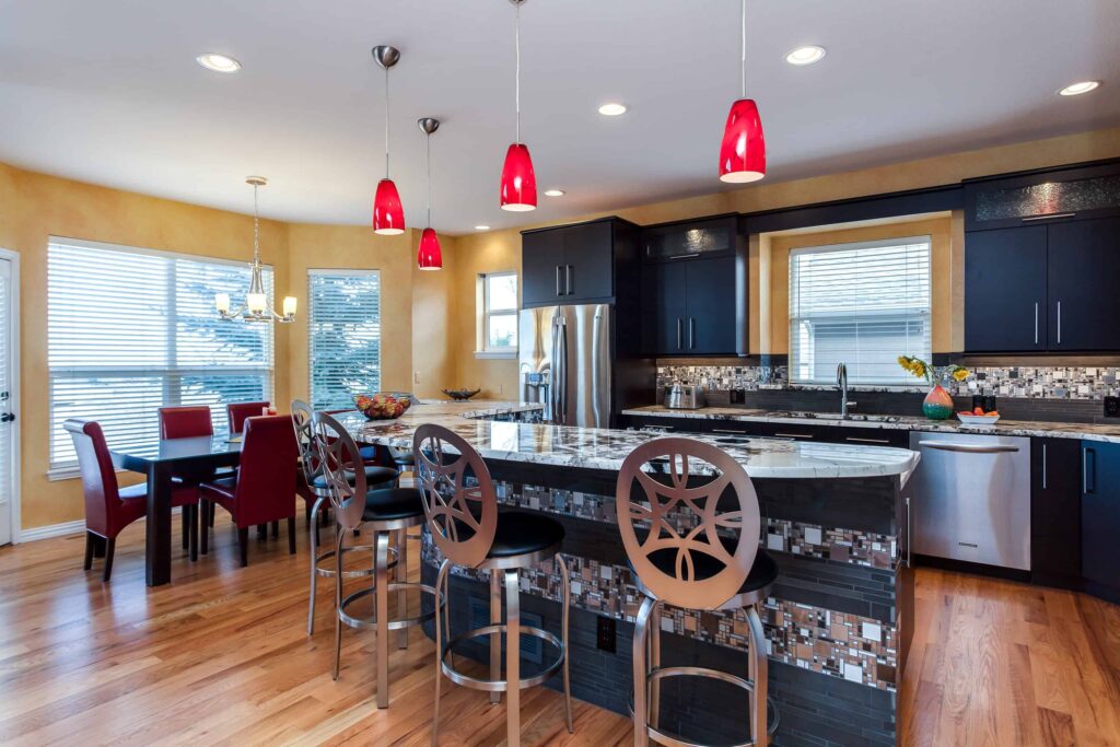 mid century modern kitchen featuring Frank Lloyd Wright inspired tile on island and backsplash JM Kitchen & Bath Design