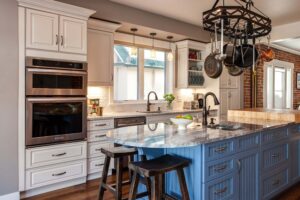 country farmhouse is the theme for kitchen remodel with light blue cabinets under island and pot holder above island JM Kitchen & Bath Design