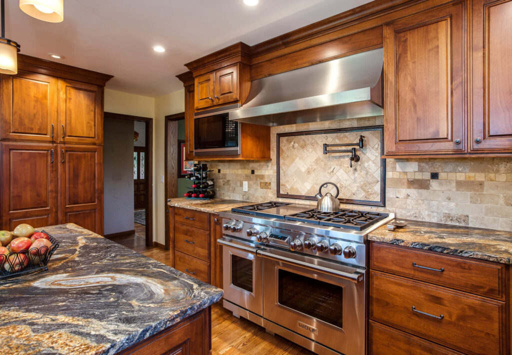 granite countertops, Wolf appliance, and updates cabinets are features of kitchen remodel JM Kitchen & Bath Design