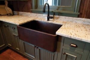 close up of copper apron sink in remodeled pantry area JM Kitchen & Bath Design