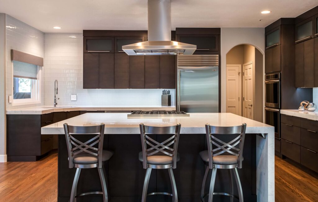 ultra modern kitchen remodel featuring 90 degree edges and white tile backsplash JM Kitchen & Bath Design