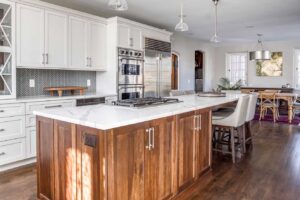 open concept kitchen with lots of white cabinets and updated appliances JM Kitchen & Bath Design