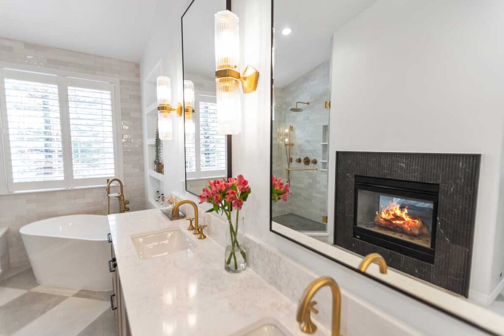 fireplace highlights a bathroom remodel JM Kitchen & Bath Design