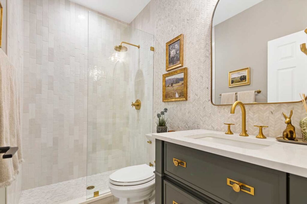 brass accents in bathroom remodel JM Kitchen & Bath Design