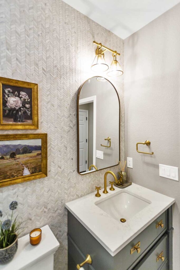 bathroom remodel highlights dark brass finishes JM Kitchen & Bath Design