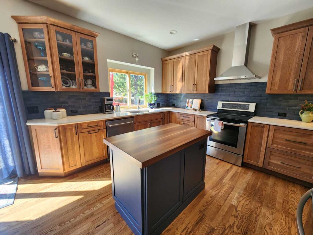 blue tile and paint accents in kitchen remodel JM Kitchen & Bath Design