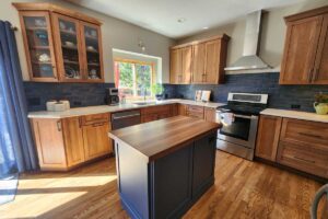 blue tile and paint accents in kitchen remodel JM Kitchen & Bath Design