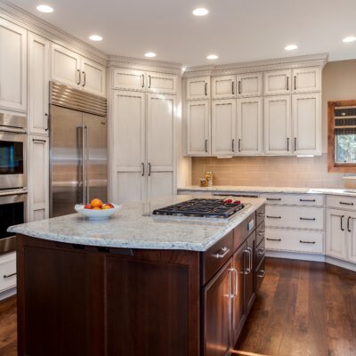 Off white cabinets with marble countertops JM Kitchen & Bath Design