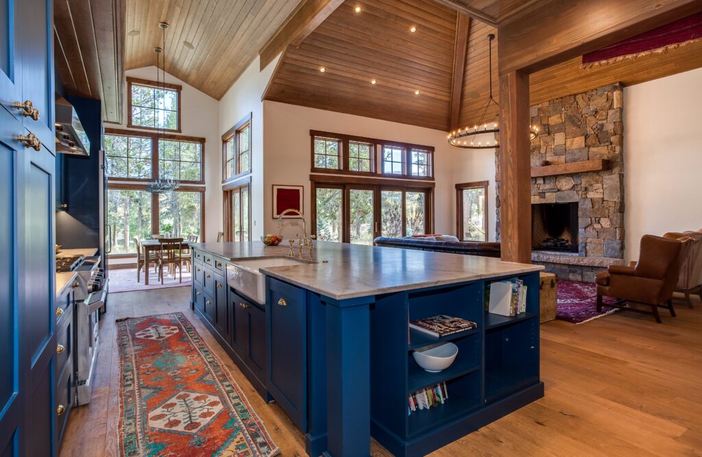 Blue painted cabinets with large center island pros and cons of open shelving