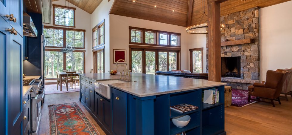 Blue painted cabinets with large center island