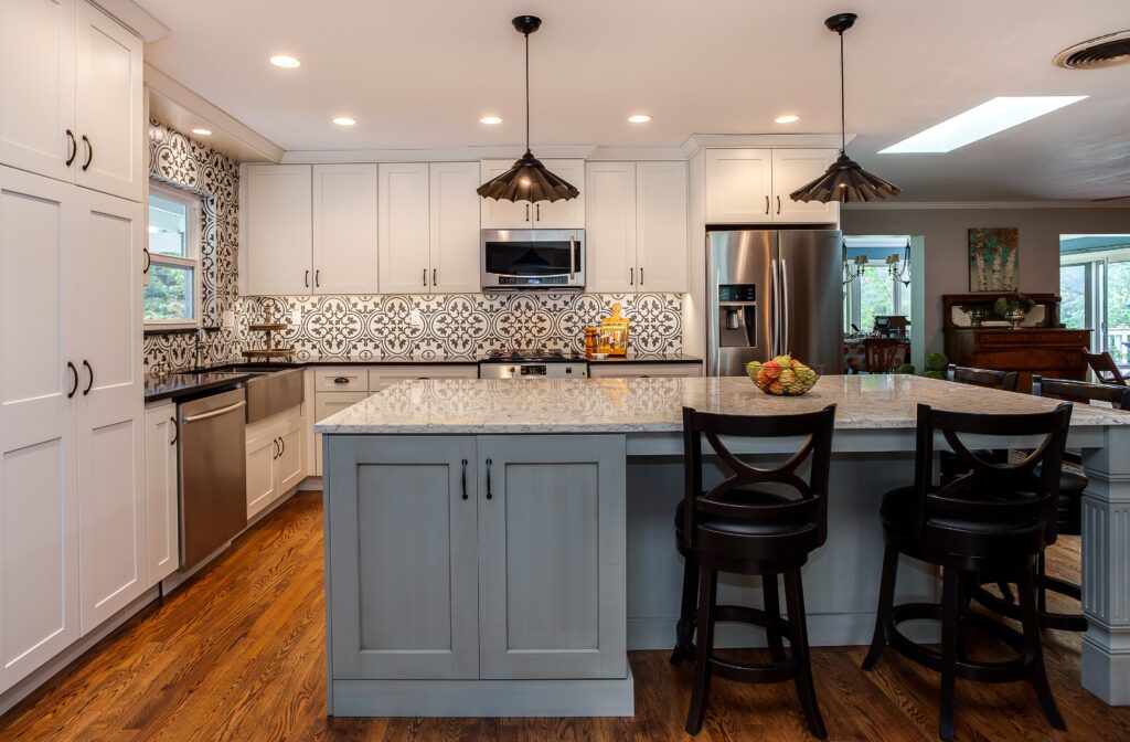 White and blue painted cabinets with granite countertop