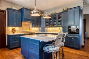 Open shelving in this blue painted kitchen remodel castle Rock colorado JM Kitchen & Bath Design