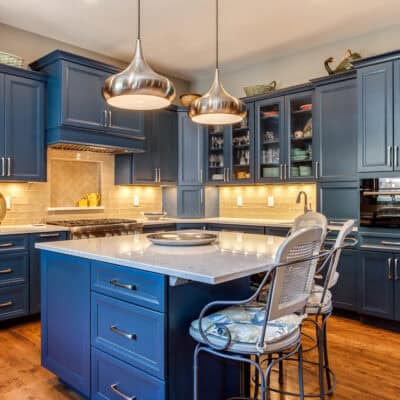 Open shelving in this blue painted kitchen remodel castle Rock colorado JM Kitchen & Bath Design