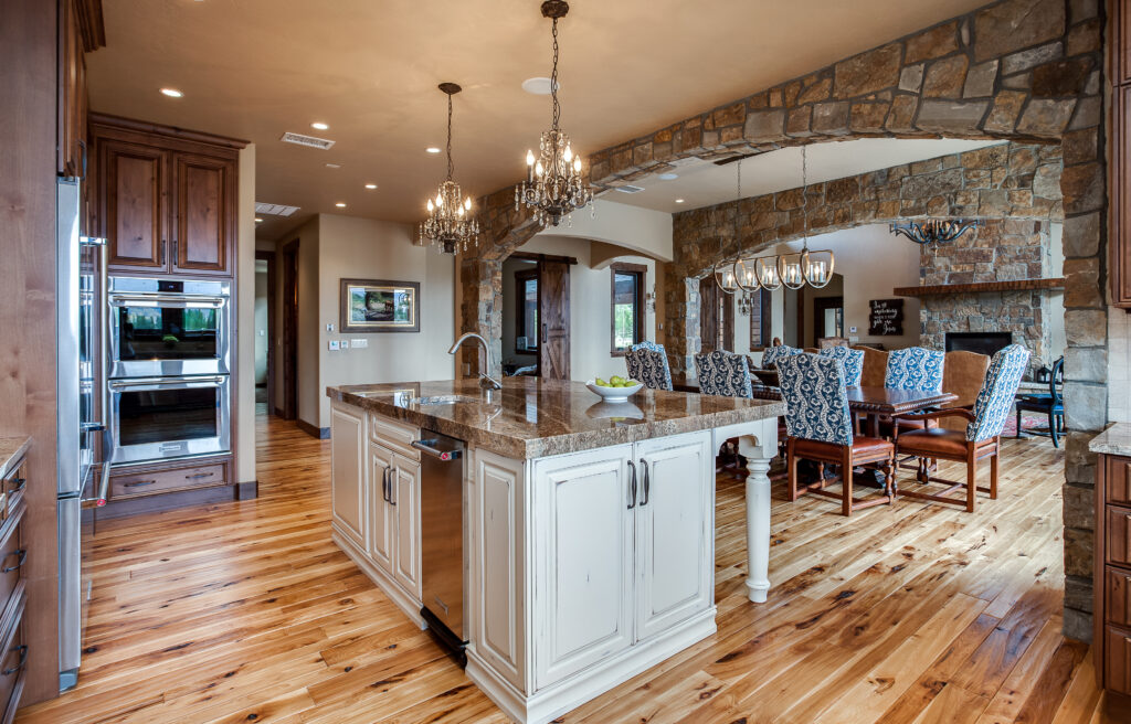 Beautiful natural wood kitchen with stone archway