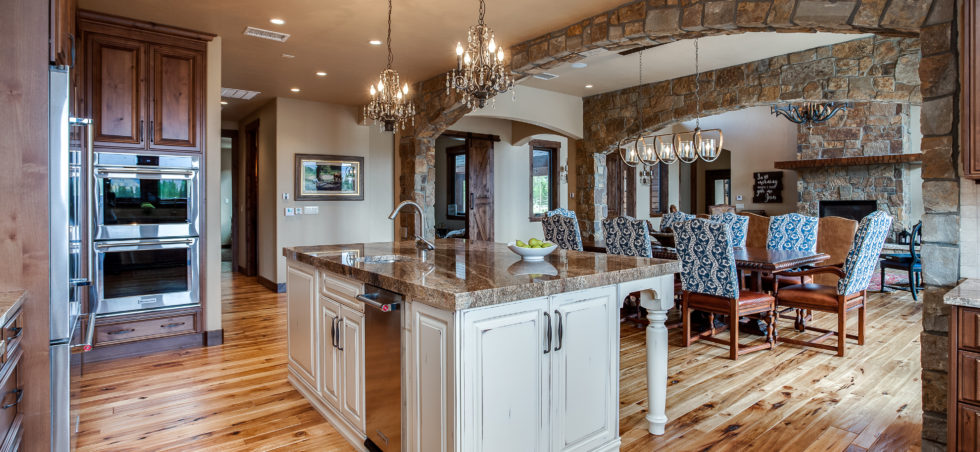 Beautiful natural wood kitchen with stone archway