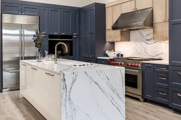 JM Kitchen & Bath Design remodeled kitchen features blue-gray cabinets and new applicances