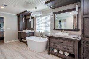 Master bath with custom built in vanities in natural wood JM Kitchen & Bath Design