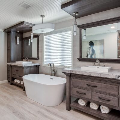 Master bath with custom built in vanities in natural wood JM Kitchen & Bath Design