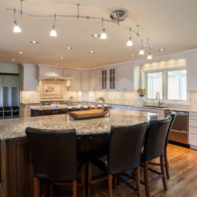 Center island with granite in kitchen JM Kitchen & Bath Design