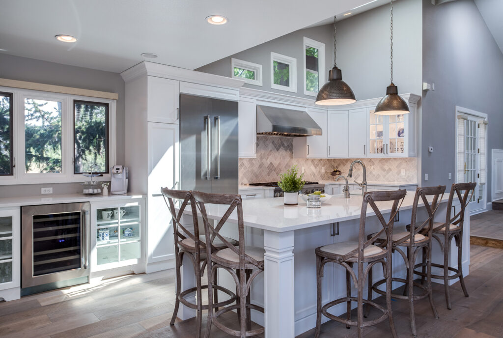 White cabinets continue to be a kitchen remodeling trend. This Greenwood Village White Shaker Kitchen Remodel shows just how beautiful a white kitchen can be