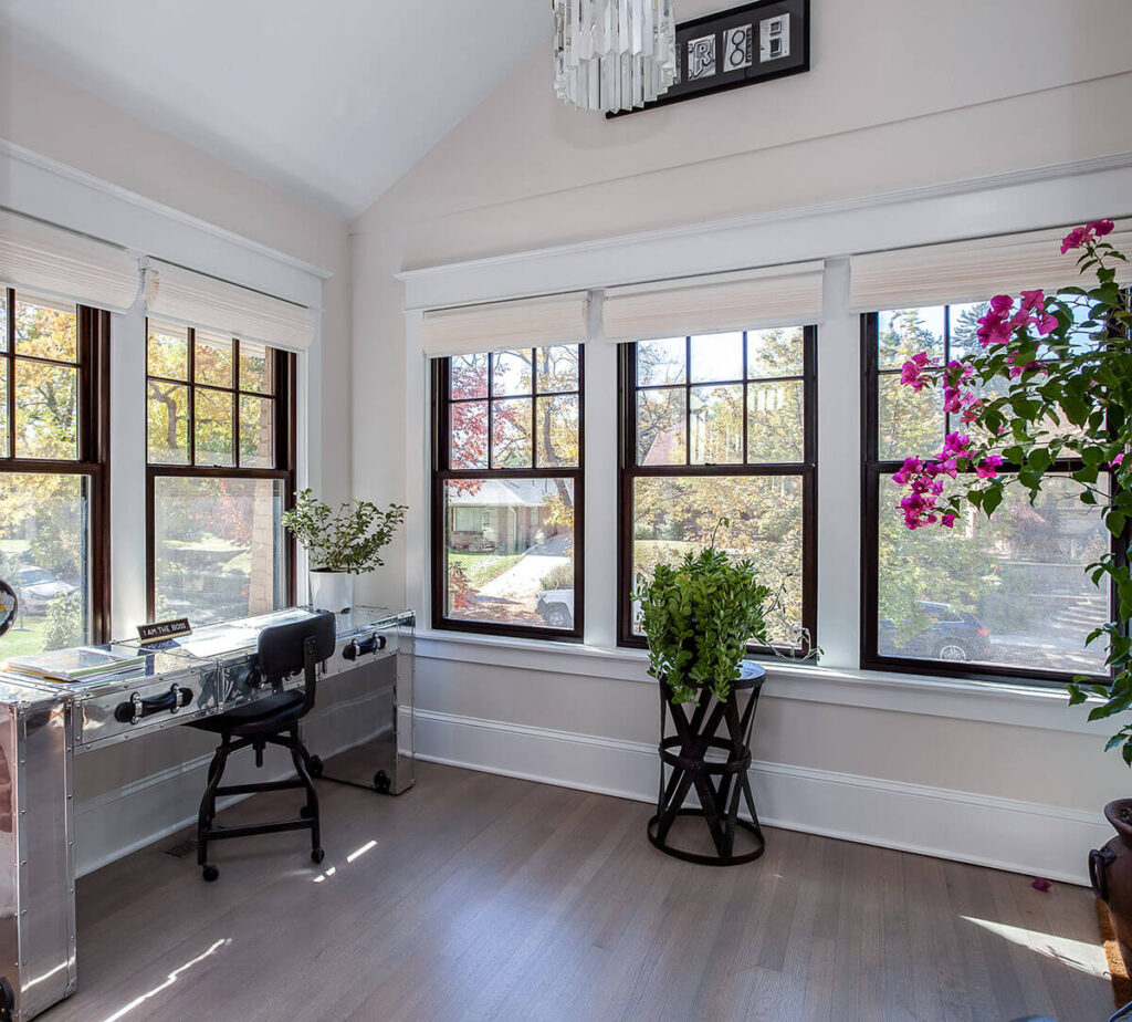 remodel from JM Kitchen & Bath Design with natural light, ultra modern desk and new flooring