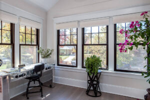 remodel from JM Kitchen & Bath Design with natural light, ultra modern desk and new flooring