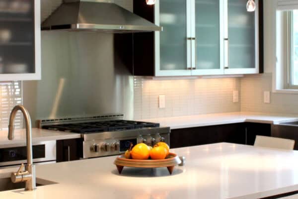 remodeled kitchen features clean, square lines with island JM Kitchen & Bath Design