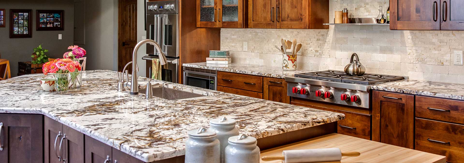 large kitchen remodel features granite countertops and updated appliances JM Kitchen & Bath Design