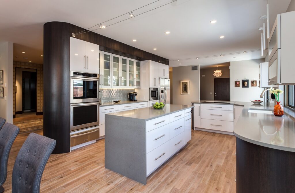 White glass cabinets with grey center island kitchen