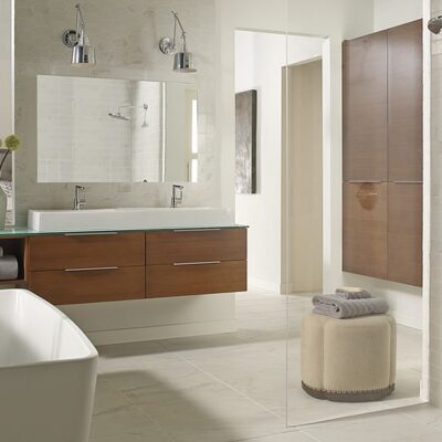 Bathroom Trends include floating cabinets and glass vanity JM Kitchen & Bath Design