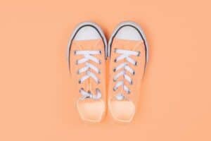 peach colored shoes with peach background JM Kitchen & Bath Design