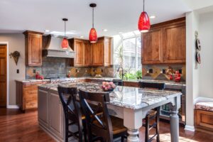 Natural wood cabinet kitchen with tile backsplash JM Kitchen & Bath Design