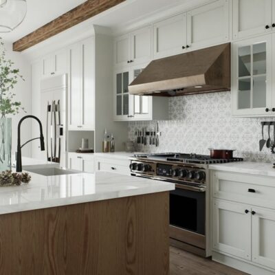 modern kitchen renovation with sink in island, large lights above island, and white cabinets JM Kitchen & Bath Design