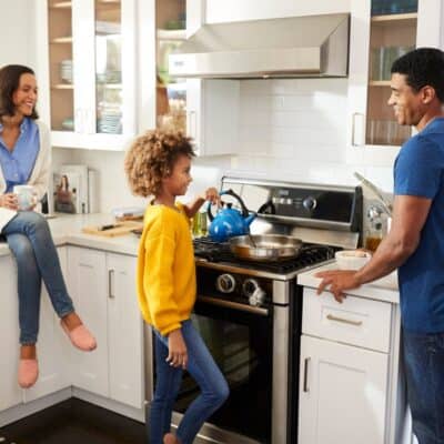 family in the denver colorado kitchen JM Kitchen & Bath Design