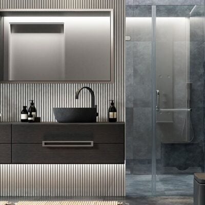 ultra modern bathroom features latest trends including paneling, dark gray finishes and bowl sinks JM Kitchen & Bath Design