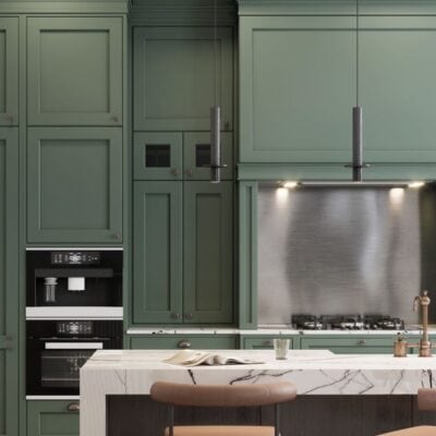 kitchen remodel features moss green cabinetry and dual island/bar JM Kitchen & Bath Design