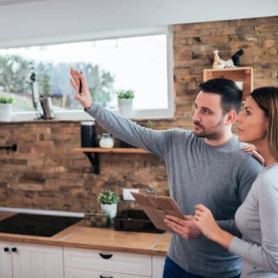 Couple talking about home renovation JM Kitchen & Bath Design