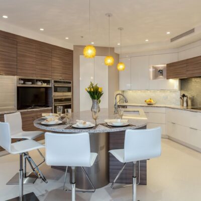 Modern kitchen with sleek grey cabinetry JM Kitchen & Bath Design