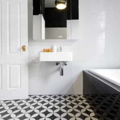 small bathroom design featuring black and white tile JM Kitchen & Bath Design