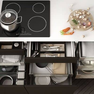 top view of organized kitchen with lots of drawers under cooktop JM Kitchen & Bath Design