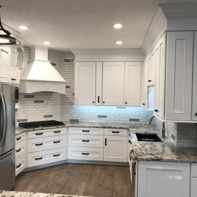 white kitchen remodel with italian subway tile JM Kitchen & Bath Design